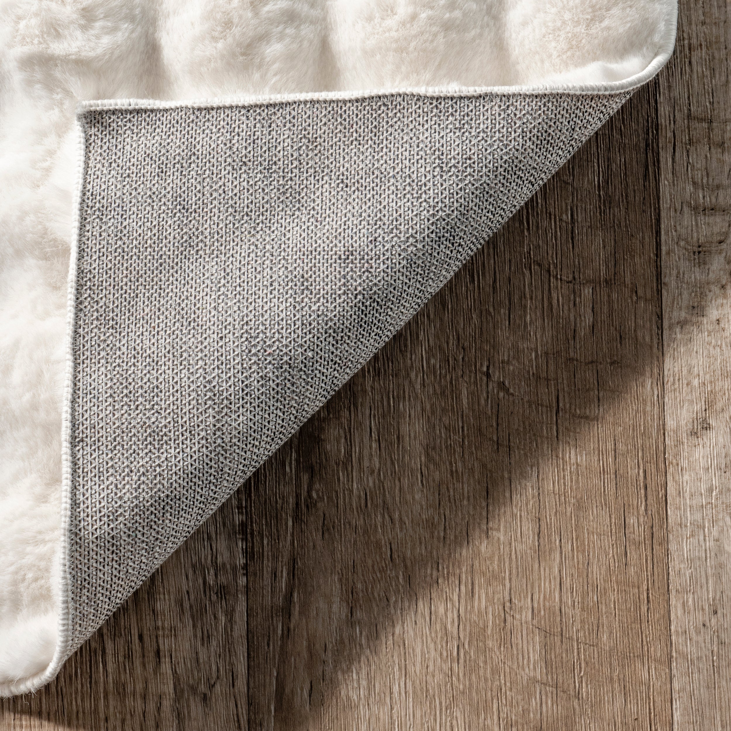 Jeni Solid Faux Rabbit Machine Washable Area Rug - Image 7