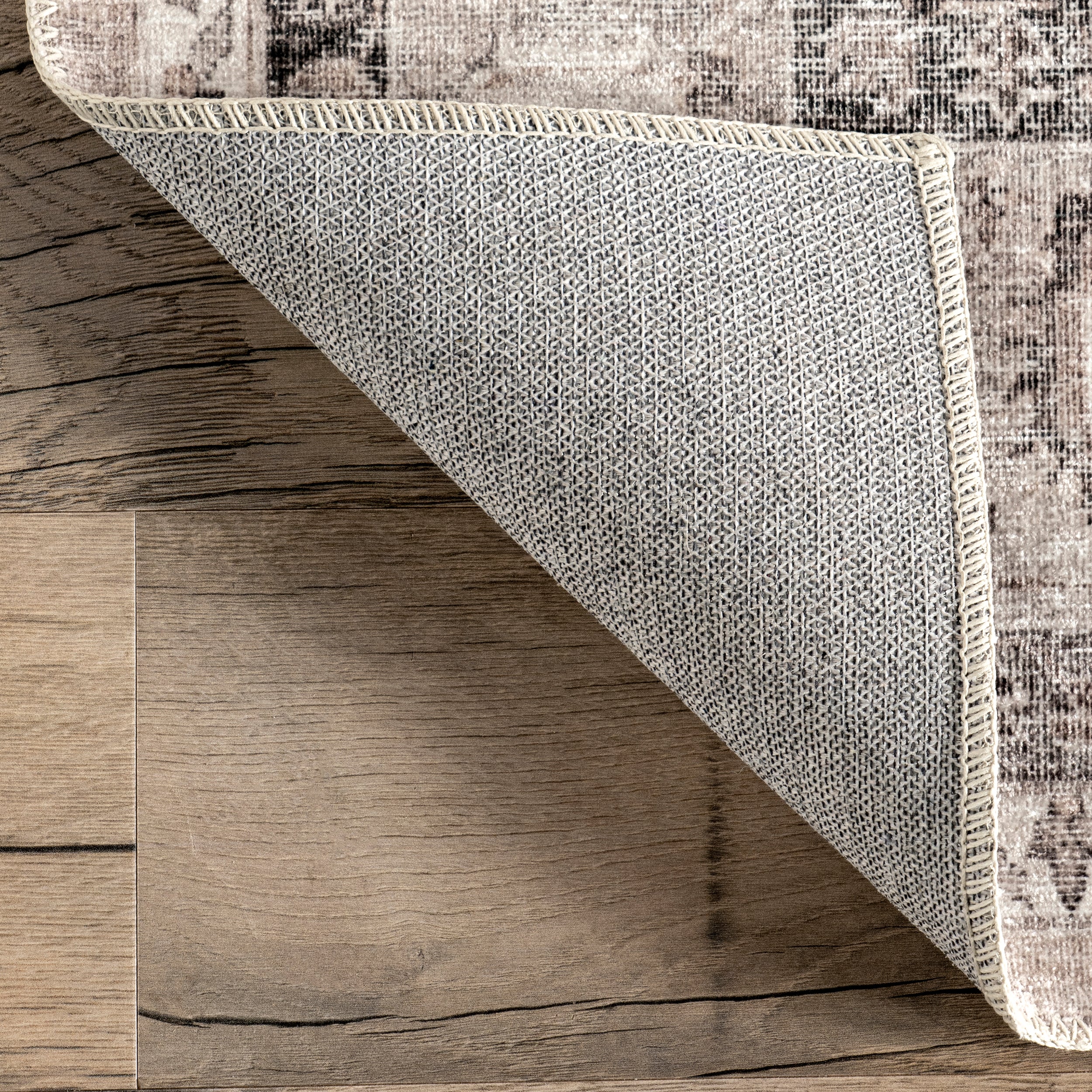 Davi Faded Stain-Resistant Machine Washable Area Rug - Image 7