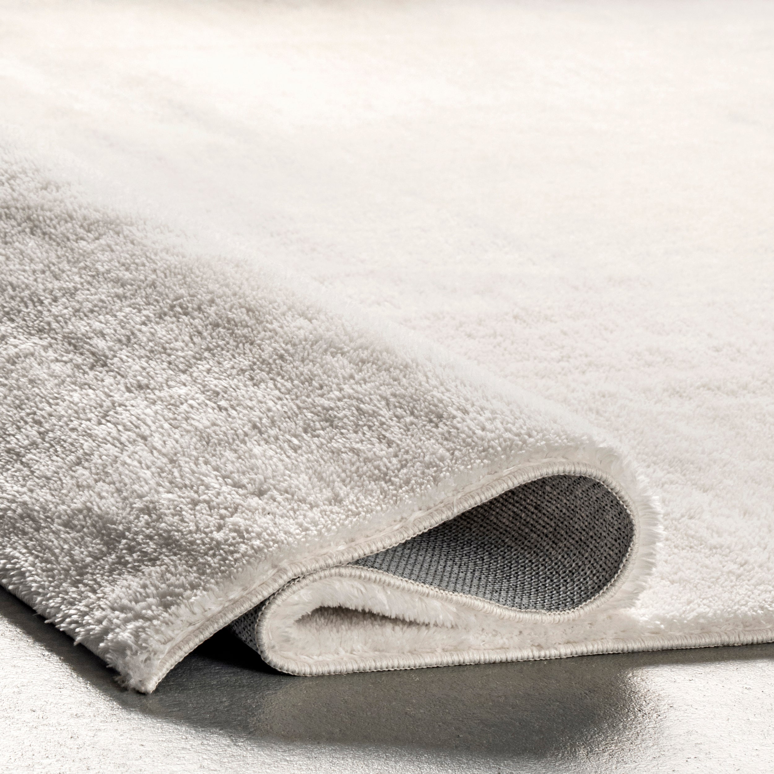 Loni Solid Machine Washable Shag Area Rug - Image 4