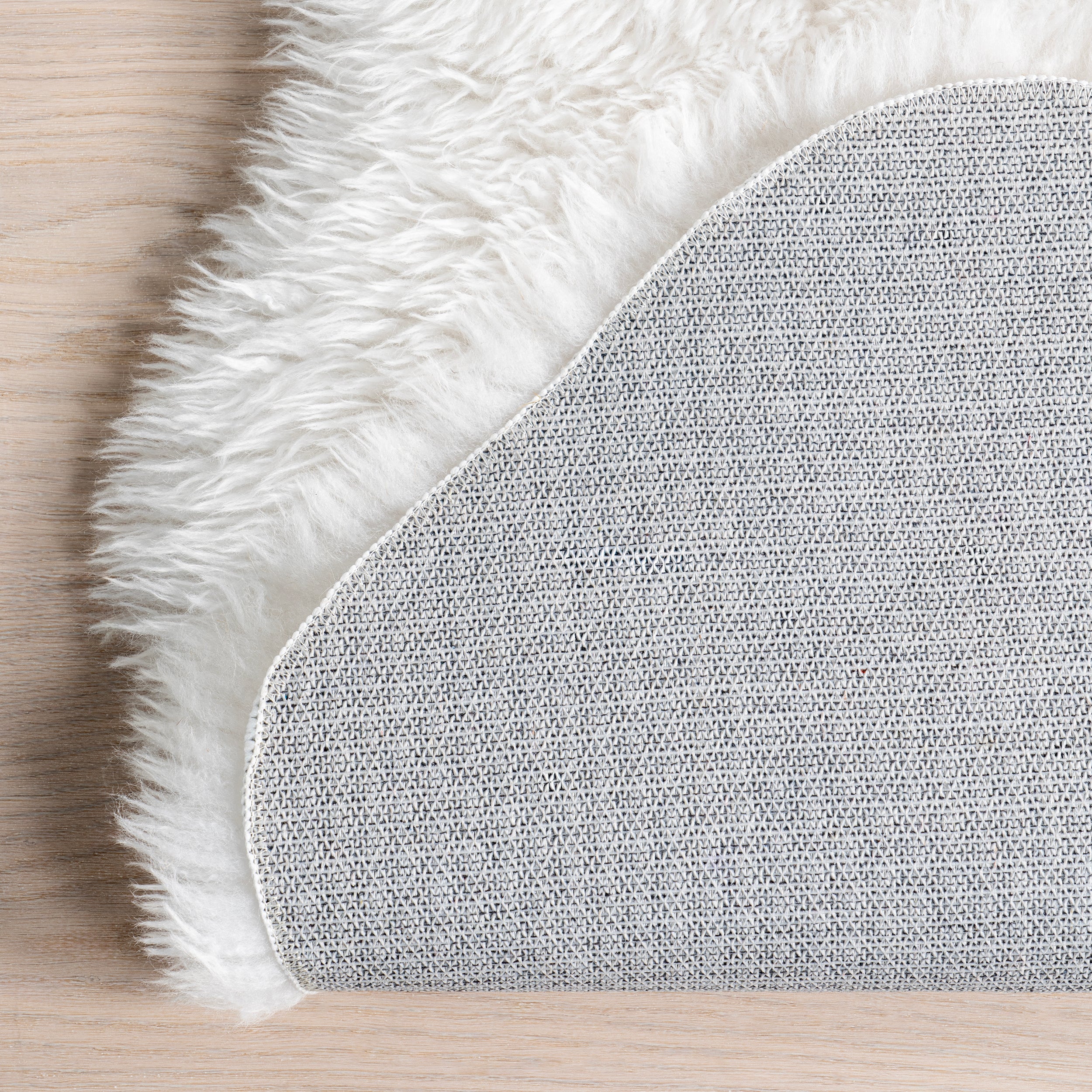 Salome Plush Faux Sheepskin Machine Washable Area Rug - Image 7